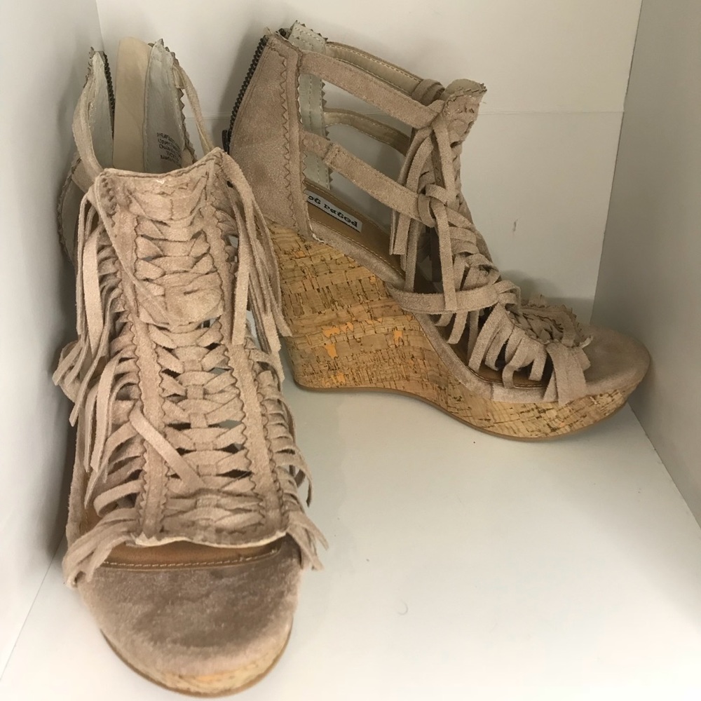 Not Rated Fringe Wedge